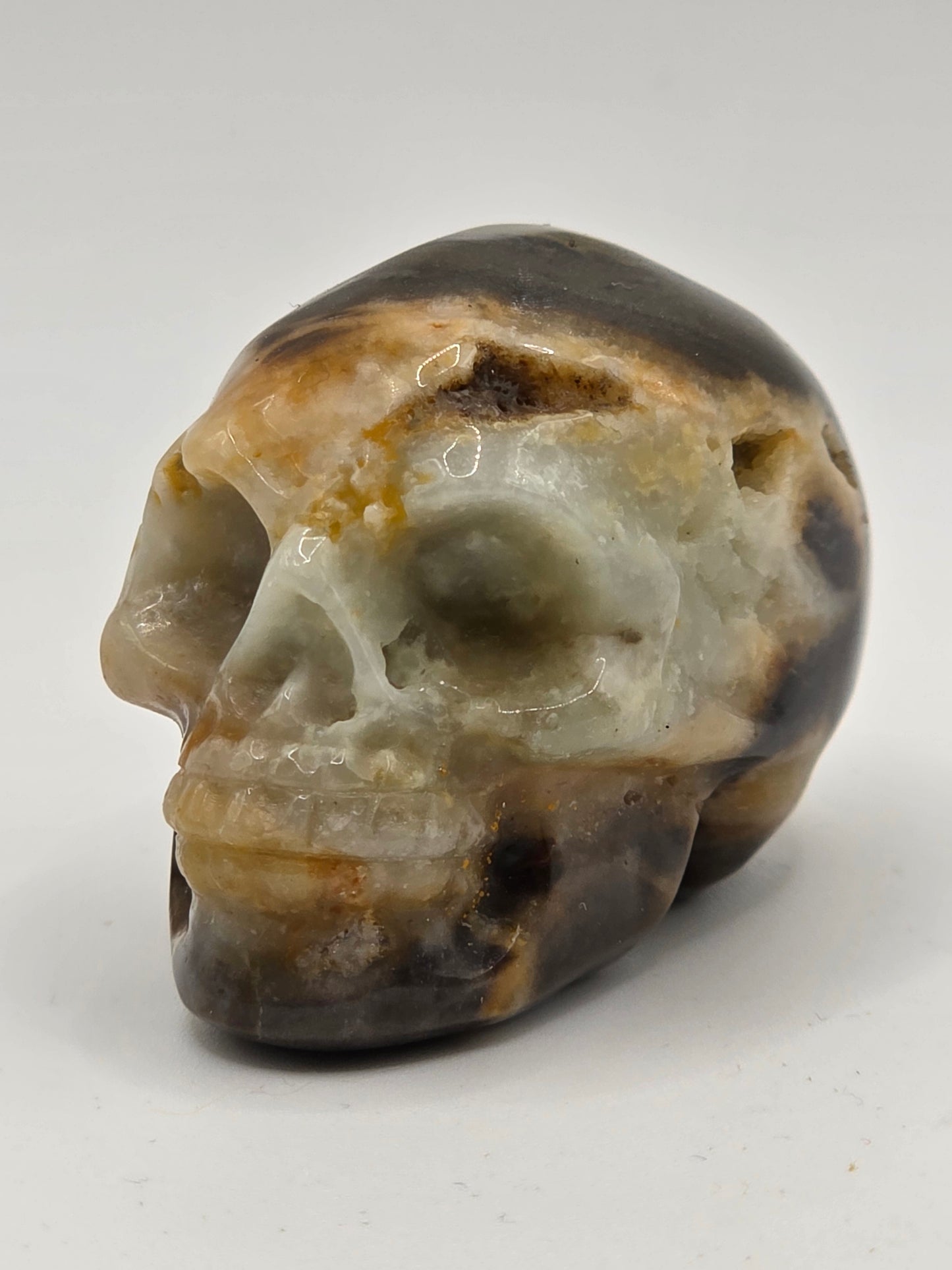 💀 Caribbean Calcite Skull Carving – Storm & Stillness (2" x 1.5" x 1.25")