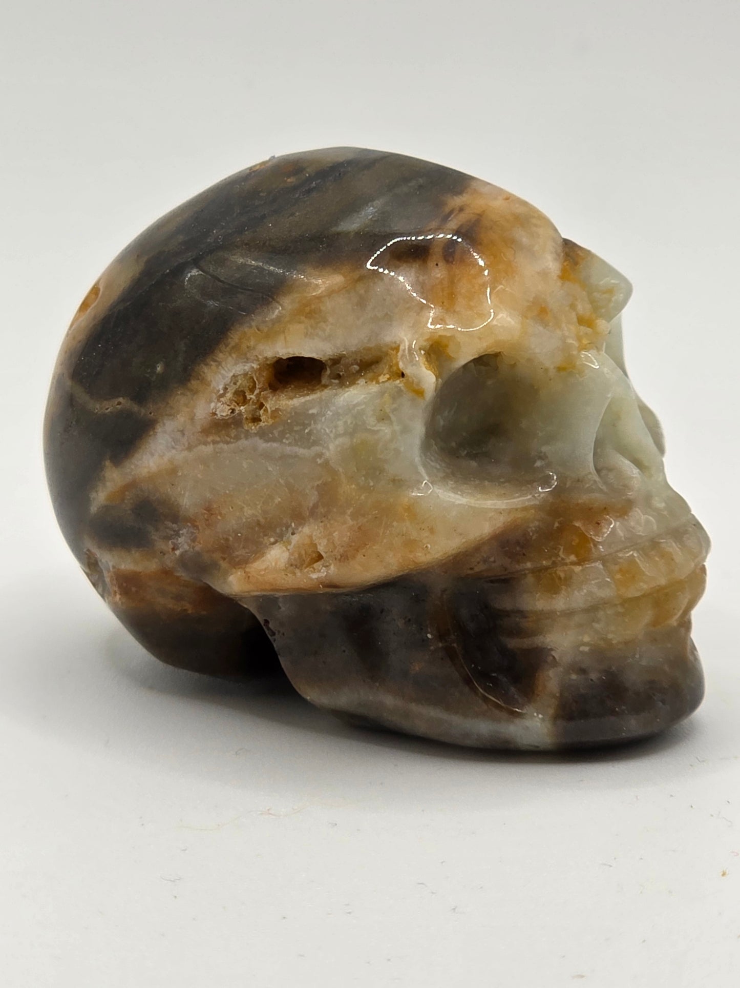 💀 Caribbean Calcite Skull Carving – Storm & Stillness (2" x 1.5" x 1.25")