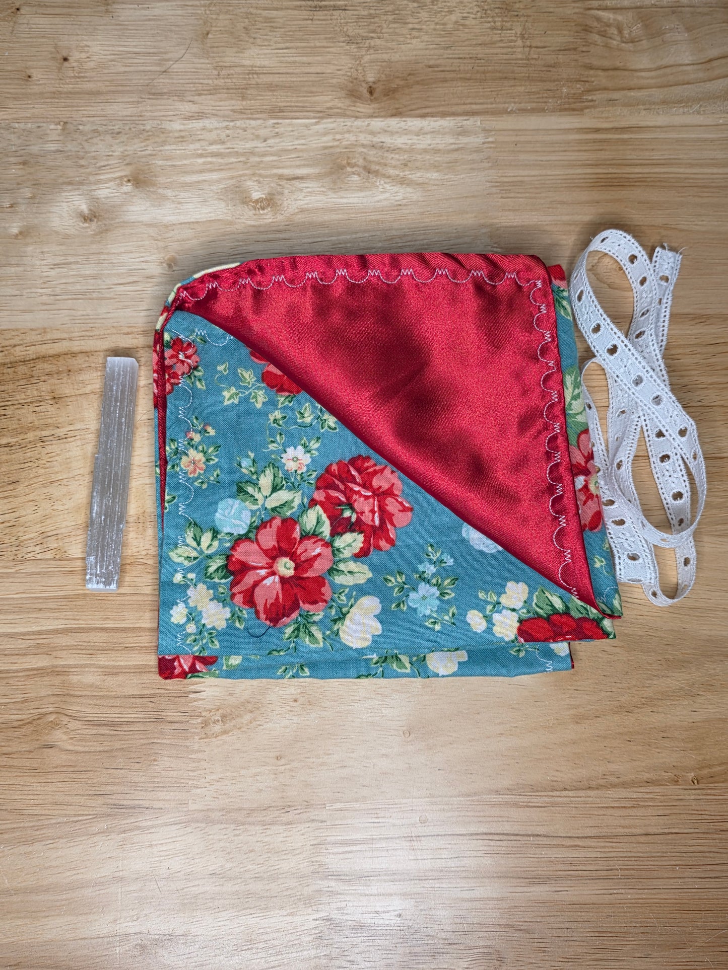 Vintage red rose tarot wrap with teal background, red satin lining, and white lace tie, includes selenite stick.