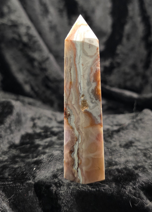 Amethyst & Crazy Lace Agate tower crystal point upright on dark background front view with natural bands