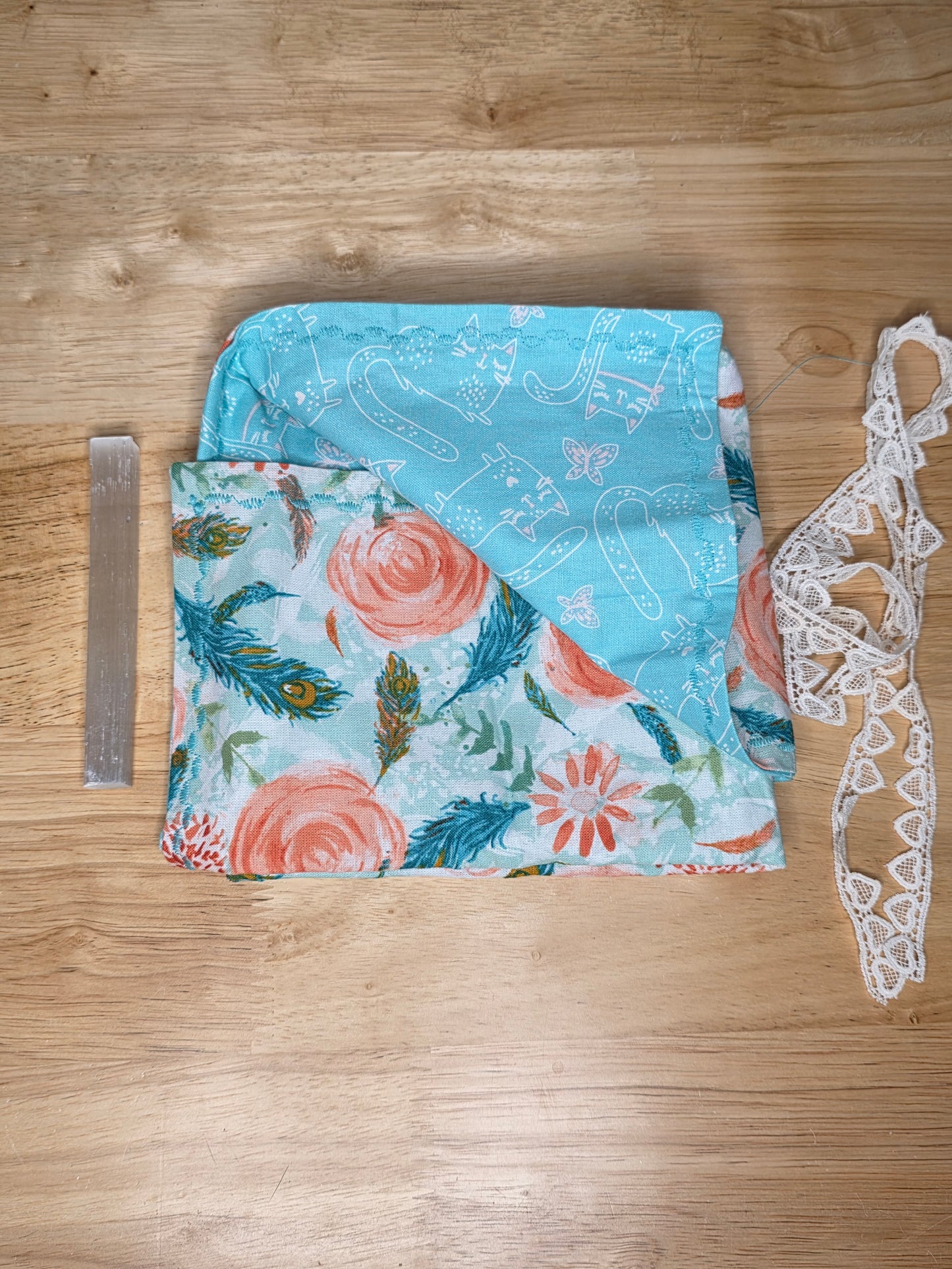Turquoise cat and floral tarot wrap with lace tie and included selenite stick for deck cleansing.