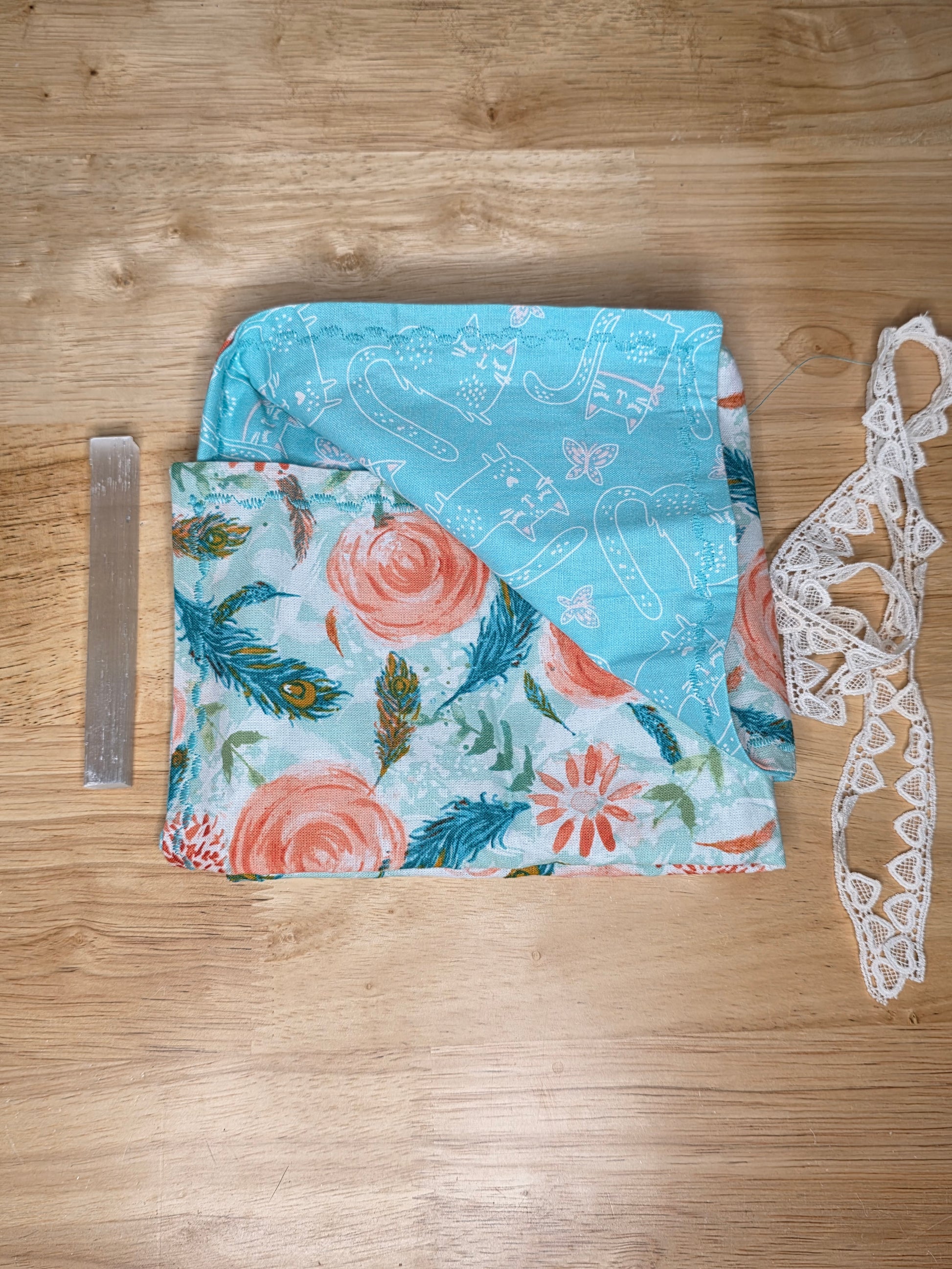 Turquoise cat and floral tarot wrap with lace tie and included selenite stick for deck cleansing.