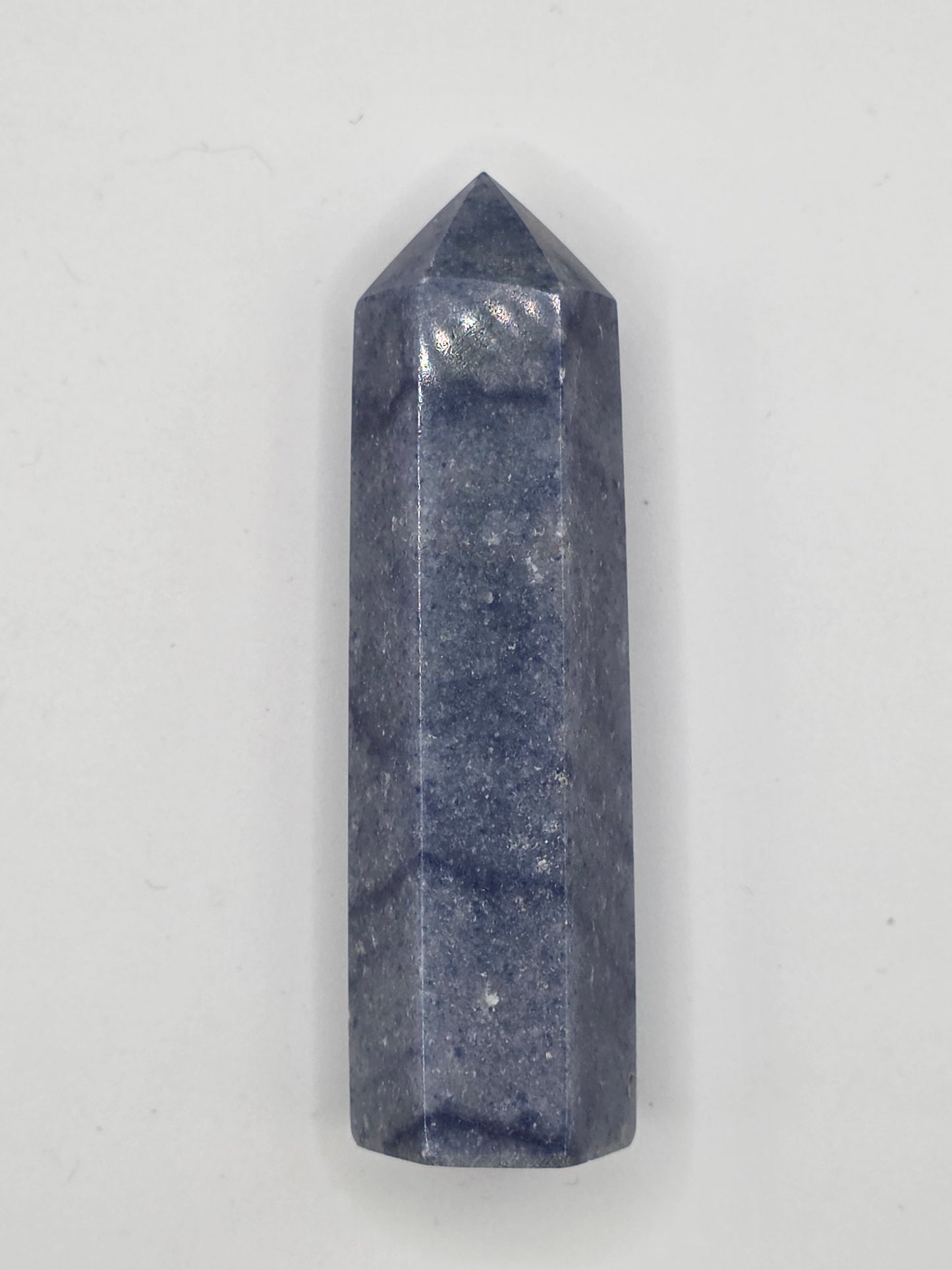 Deep indigo Dumortierite crystal tower, 3.12 inches tall, with natural blue marbling. Promotes focus and mental clarity.
