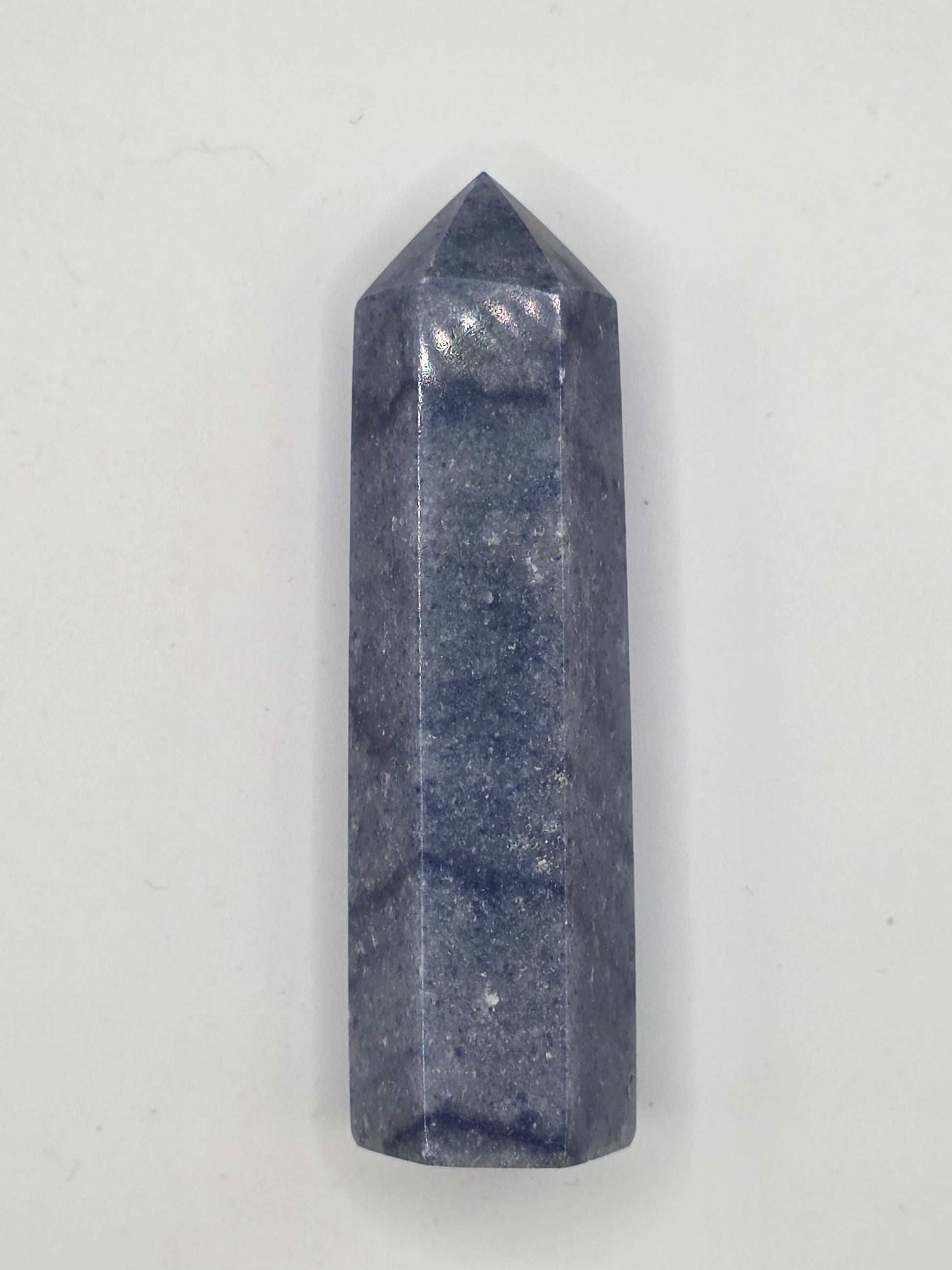 Deep indigo Dumortierite crystal tower, 3.12 inches tall, with natural blue marbling. Promotes focus and mental clarity.