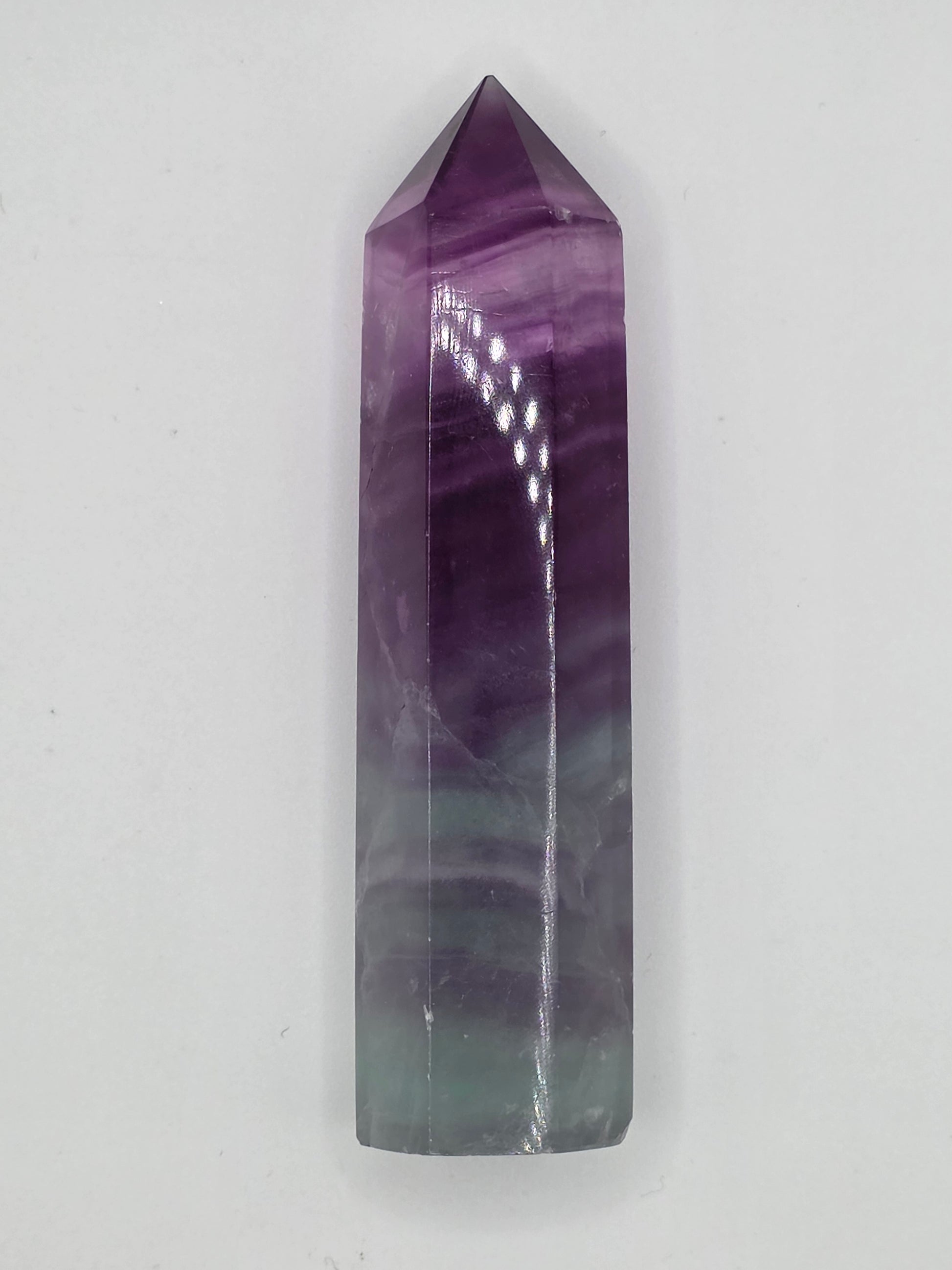 Angled view of Fluorite tower showing color gradient and translucence.