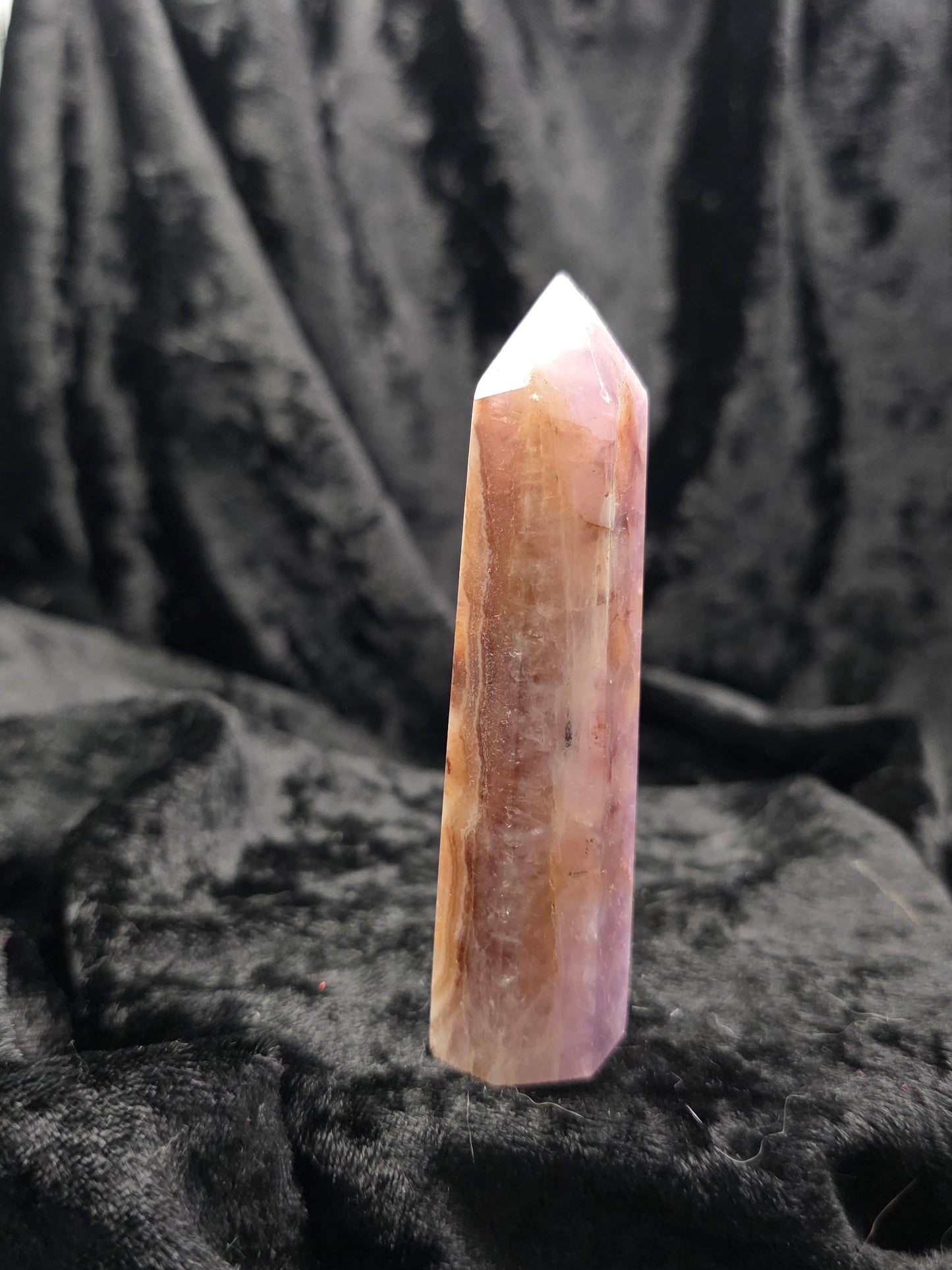 Amethyst & Crazy Lace Agate tower crystal point upright on dark background angled view